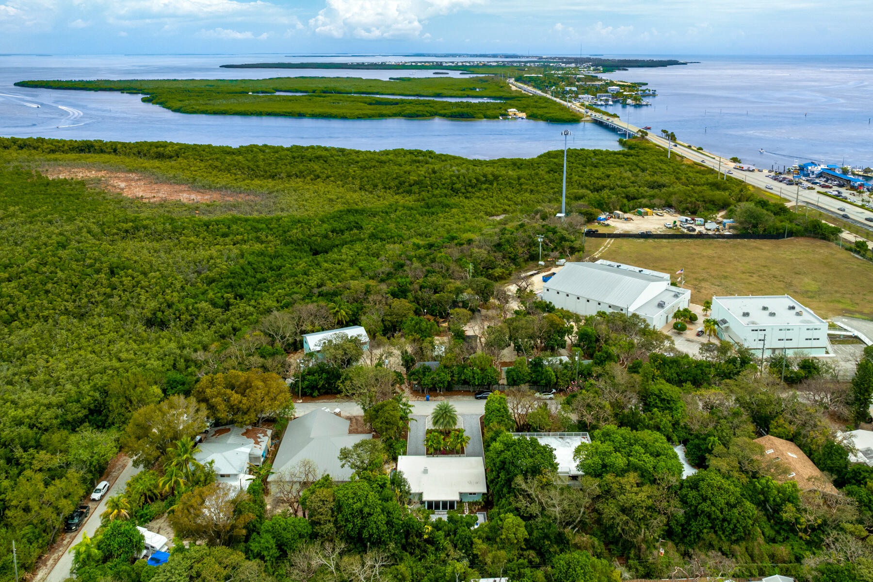 32 Park Road Islamorada, FL 33036 - Photo 41 of 48 an aerial view of ocean with residential house with outdoor space and trees around