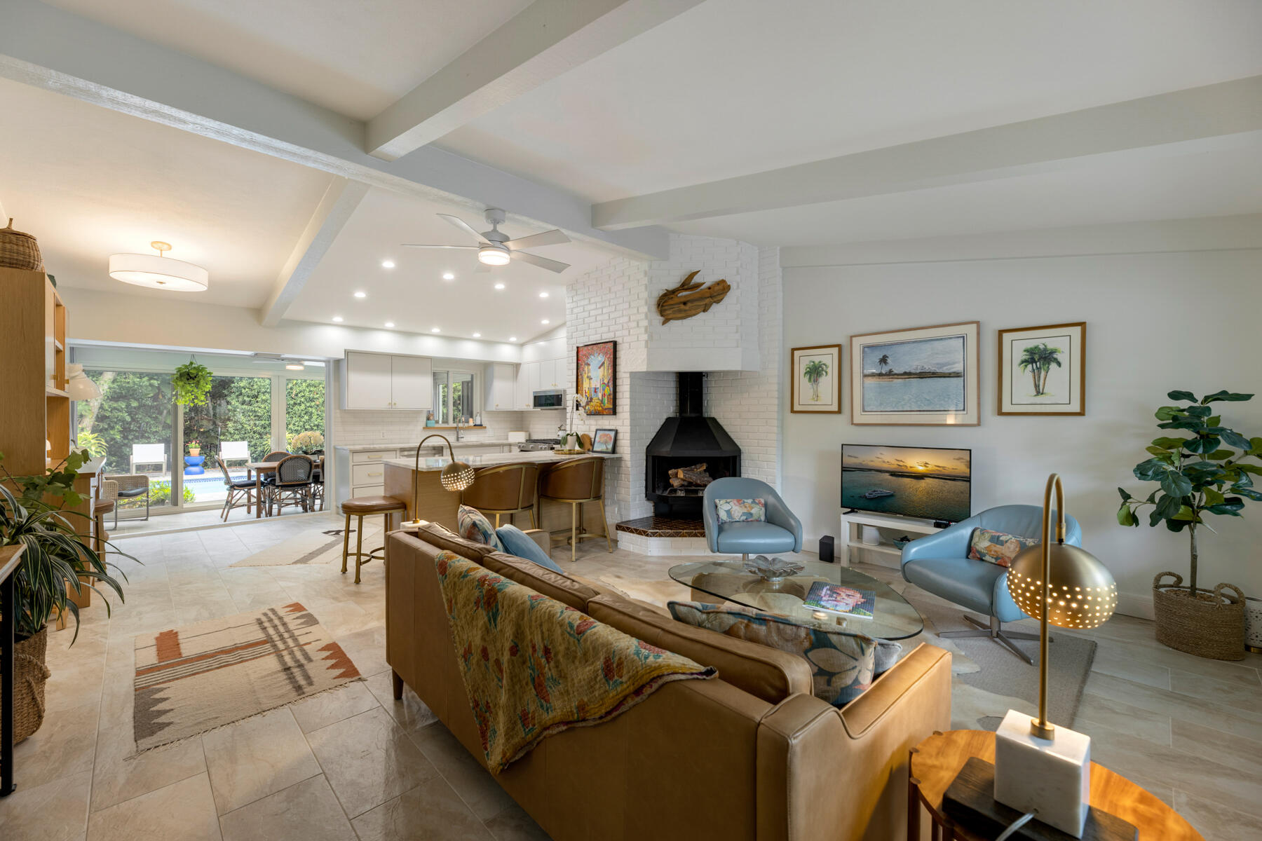 32 Park Road Islamorada, FL 33036 - Photo 47 of 48 a living room with furniture a dining table and a potted plant