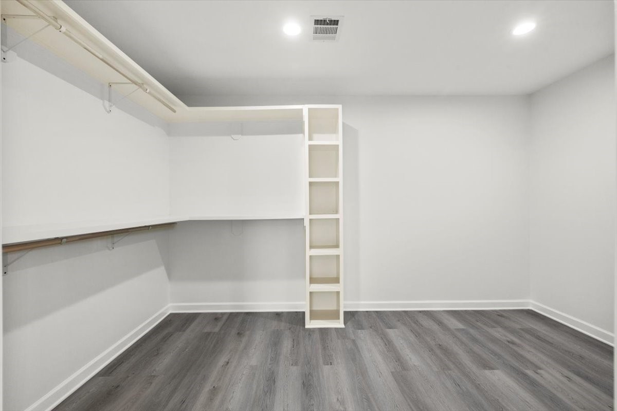 727 East 40th Street Houston, TX 77022 - Photo 16 of 22 a view of an empty room with wooden floor