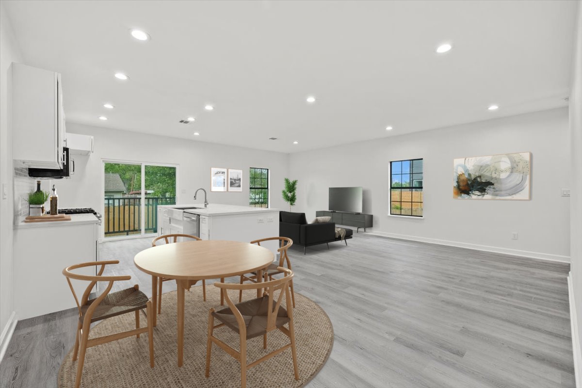 727 East 40th Street Houston, TX 77022 - Photo 5 of 22 a living room with furniture a table and a window