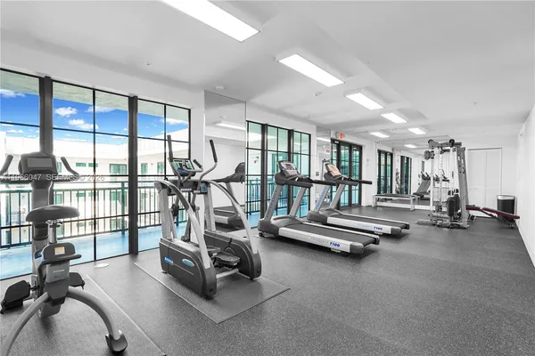 a view of a room with gym equipment