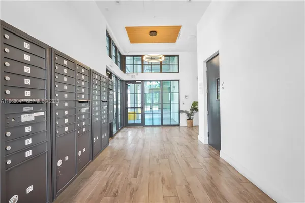 a view of entryway with wooden floor