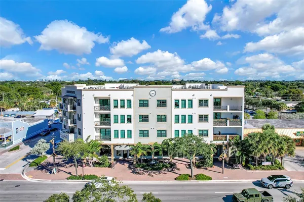 a view of a building and a yard