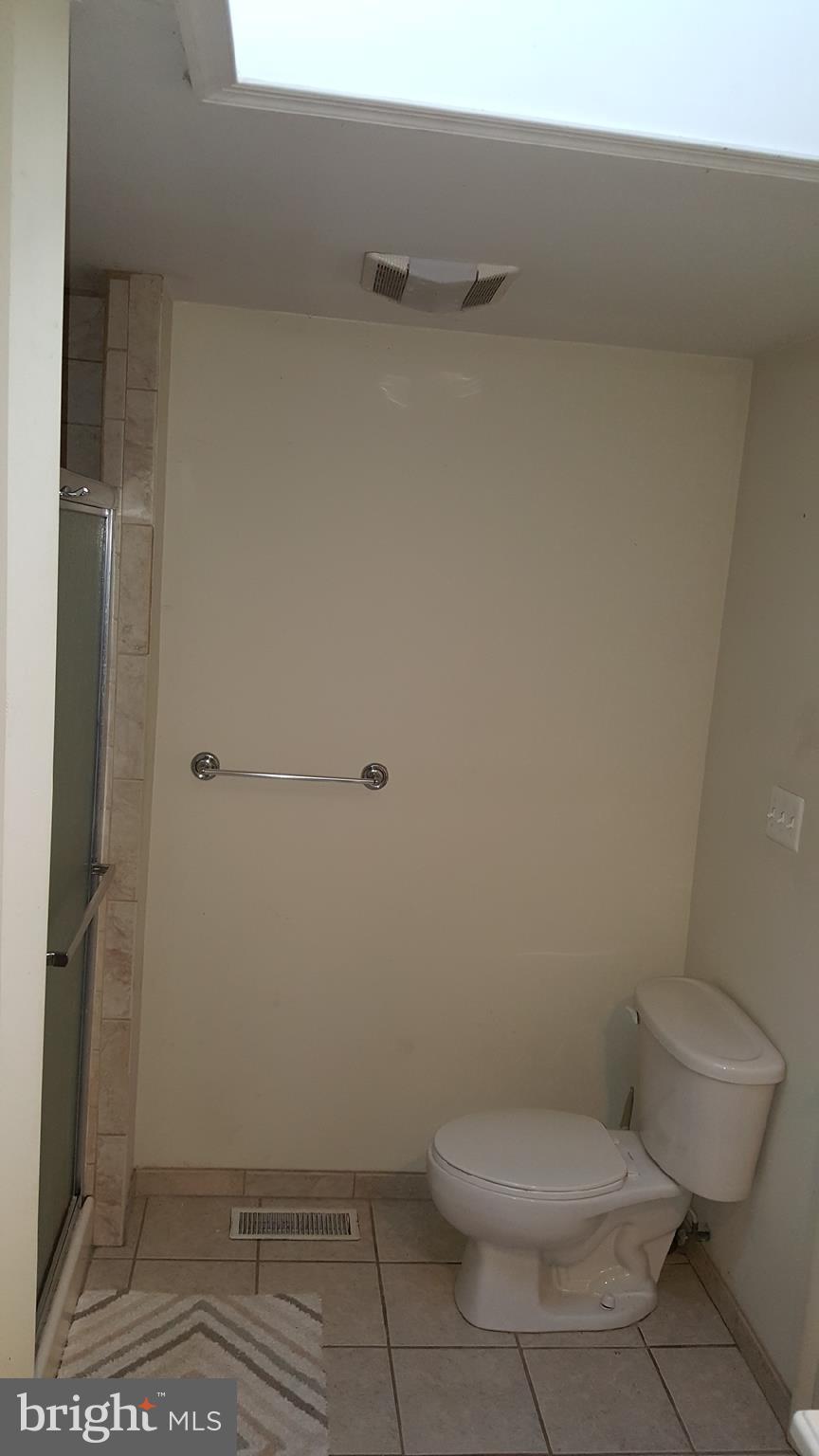 9002 Ardmore Road Springdale, MD 20706 - Photo 16 of 21 Bath (Master) Separate walk in shower
