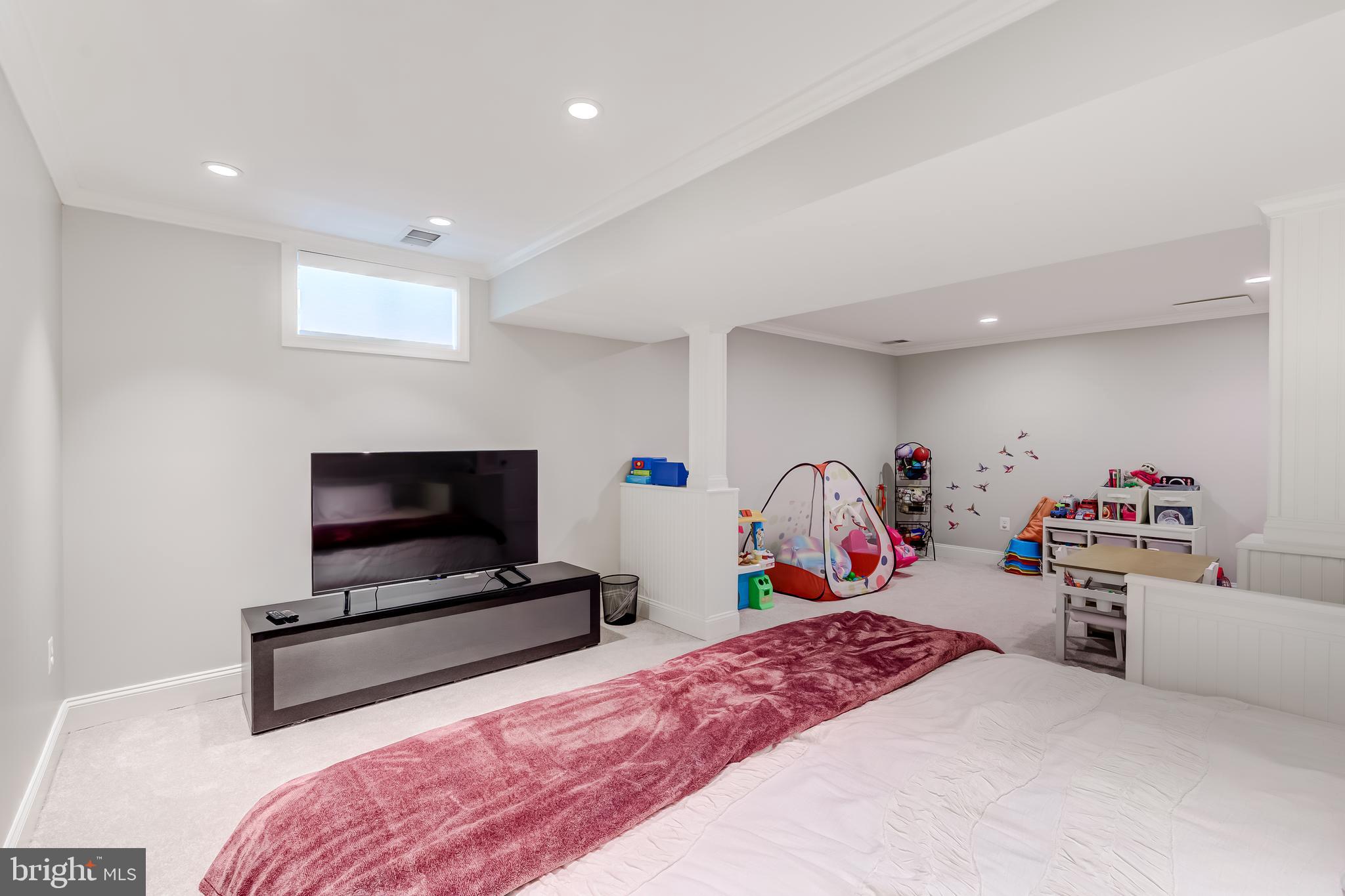 11926 Appling Valley Road Fairfax, VA 22030 - Photo 12 of 60 a bedroom with bed and a tv