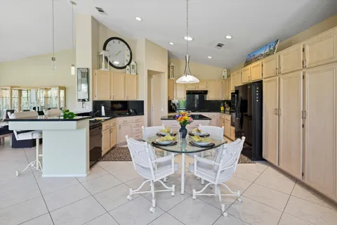 a bed room with a bed and a television