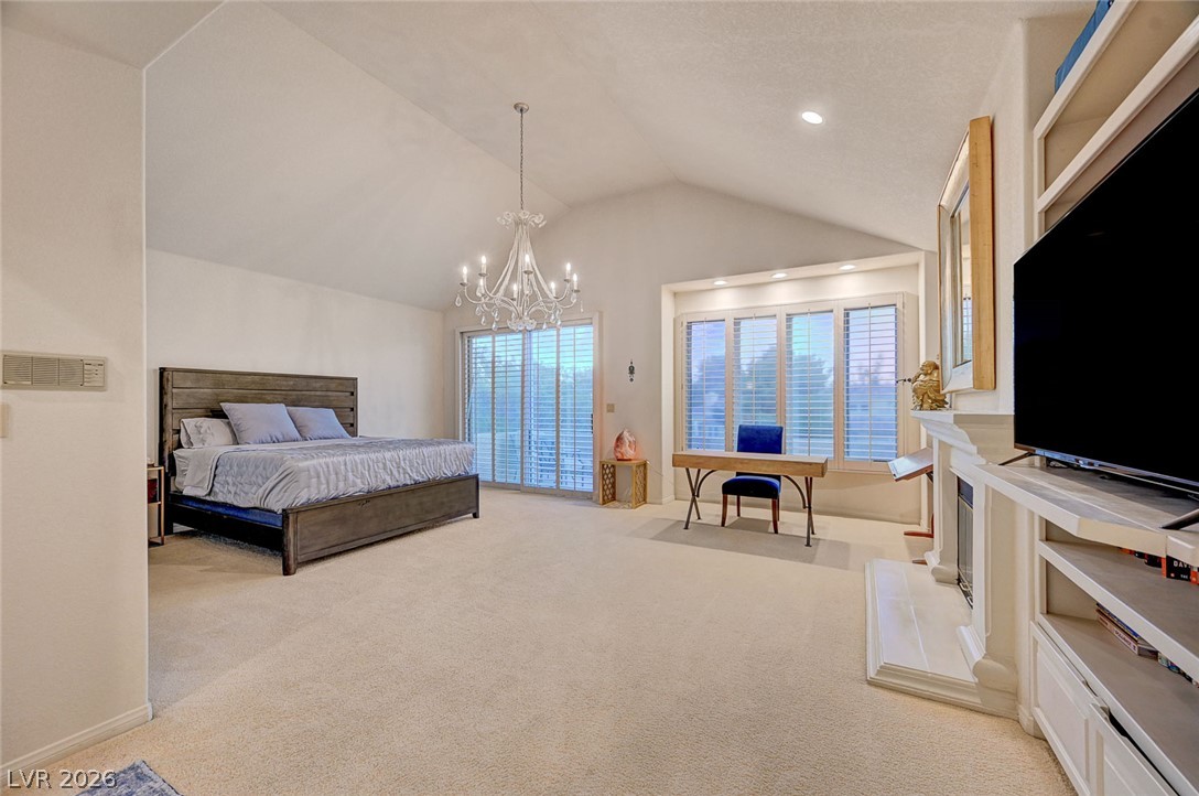 7995 Rio Rico Drive Las Vegas, NV 89113 - Photo 33 of 92 A spacious sleeping area offers vaulted ceilings and abundant natural light.