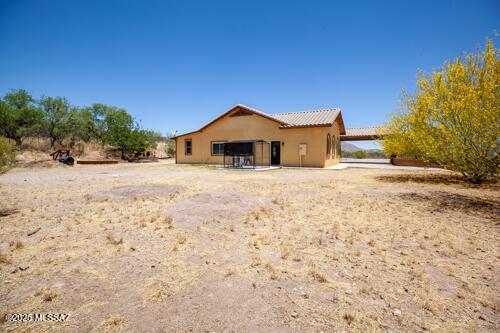 480 Camino Ramanote Rio Rico, AZ 85648 - Photo 26 of 43 East view of yard and house.