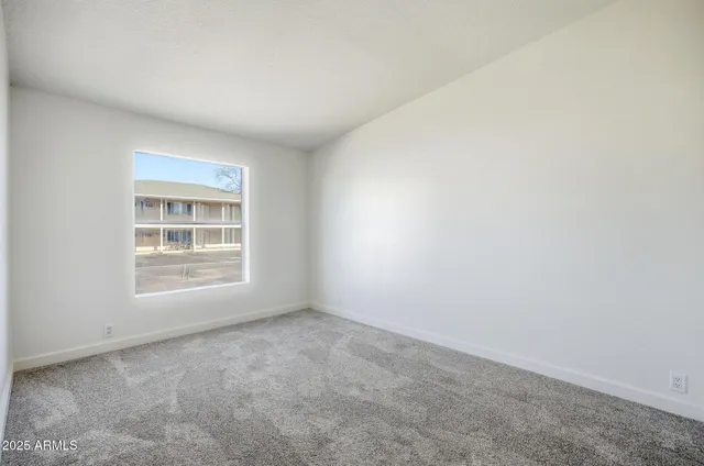 a bathroom with a sink double vanity and a mirror