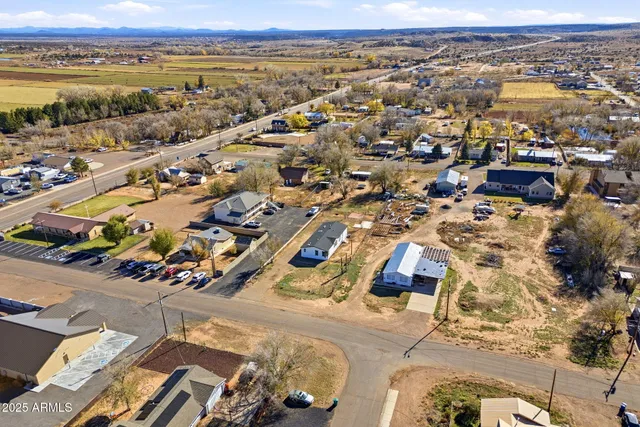 an aerial view of residential building and lake view
