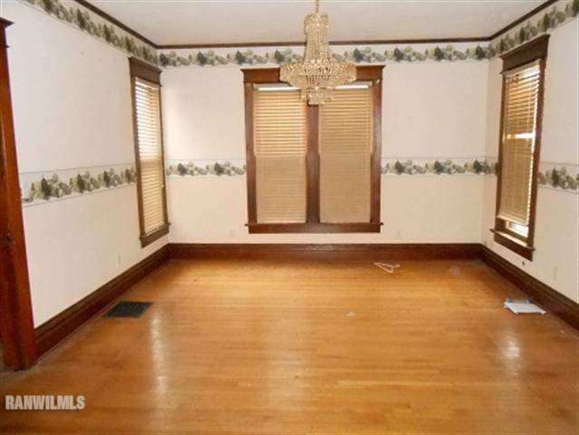102 Washington Street Ridott, IL 61067 - Photo 3 of 11 a view of a room with window