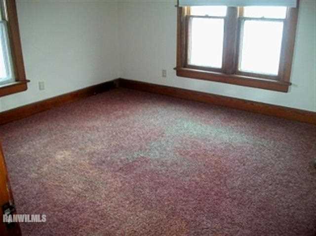 102 Washington Street Ridott, IL 61067 - Photo 7 of 11 a view of a room that has a window in it