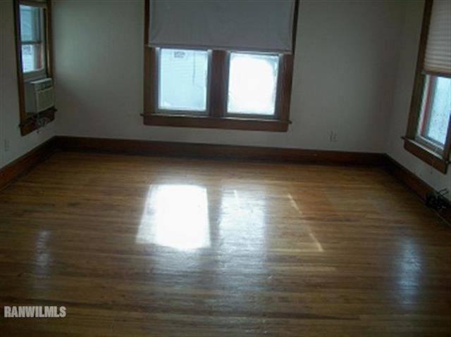 102 Washington Street Ridott, IL 61067 - Photo 8 of 11 a view of empty room with window