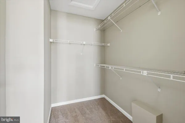 a view of a room with racks on the wall