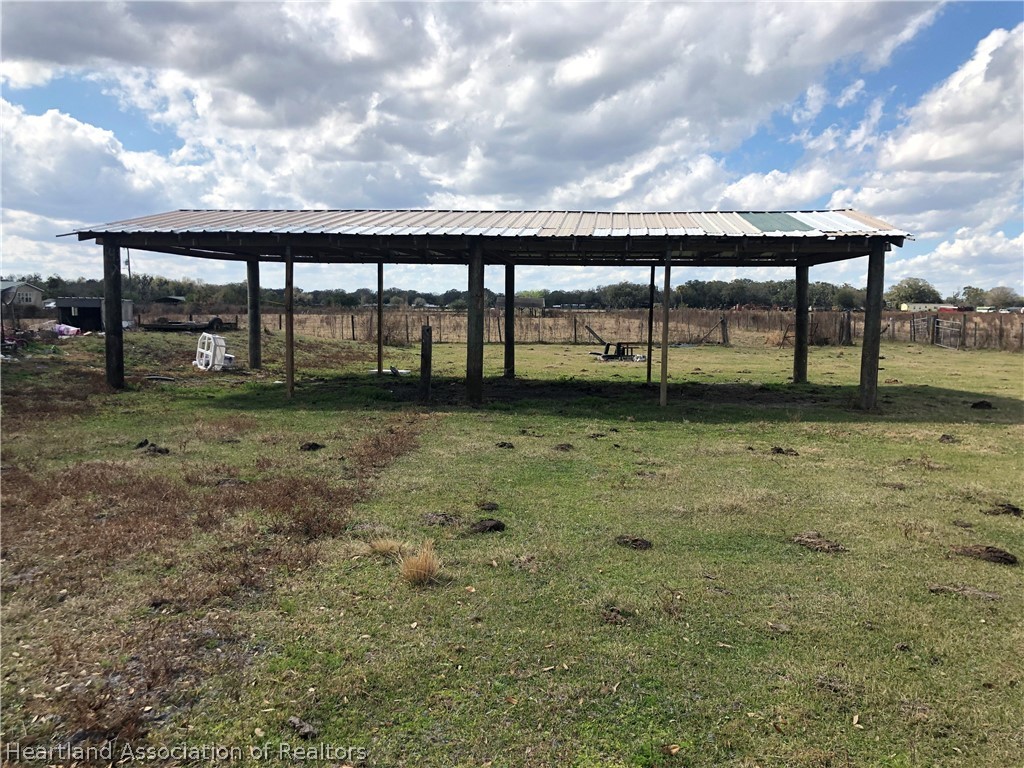 555 Sumner Road Wauchula, FL 33873 - Photo 4 of 11 a view of a yard with a slide