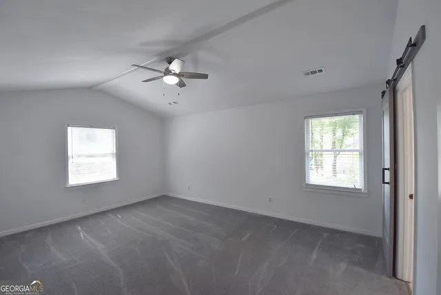 a bathroom with a sink vanity and a mirror