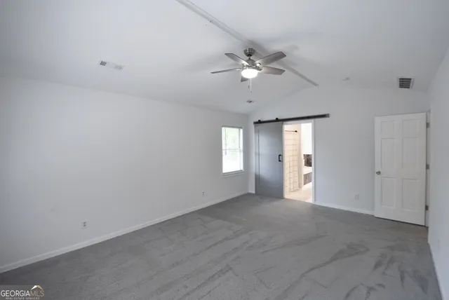 a bathroom with a tub and a shower