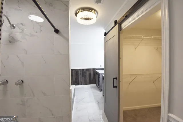 a view of a porch with wooden floor