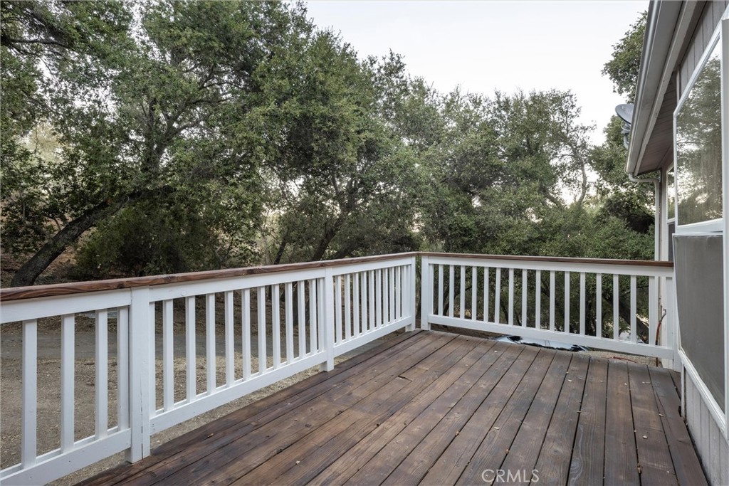 3550 Ardana Road Paso Robles, CA 93446 - Photo 16 of 23 a balcony with wooden floor and fence