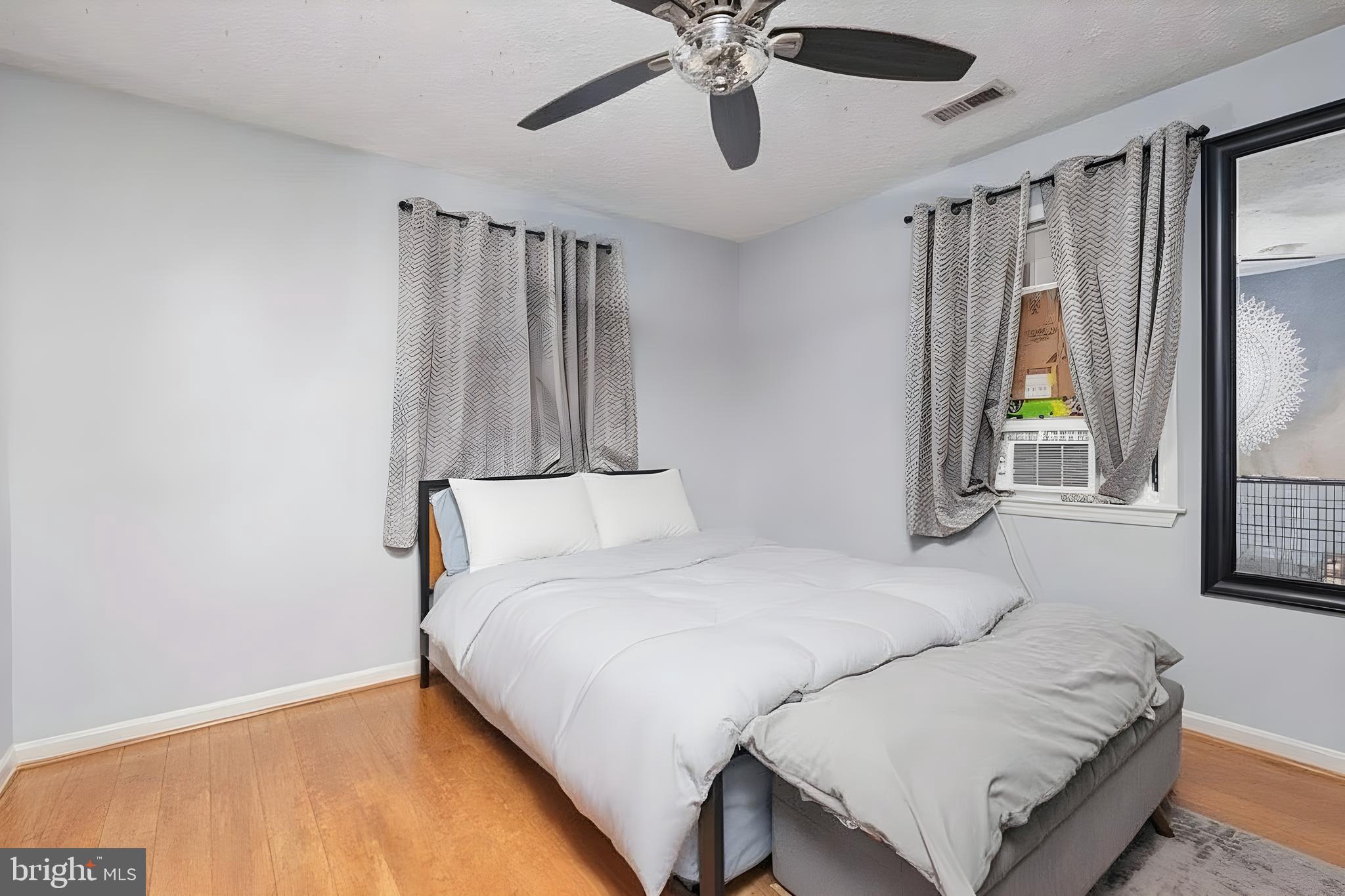 1839 Harbor Drive Chester, MD 21619 - Photo 11 of 23 a bedroom with a bed mirror and window