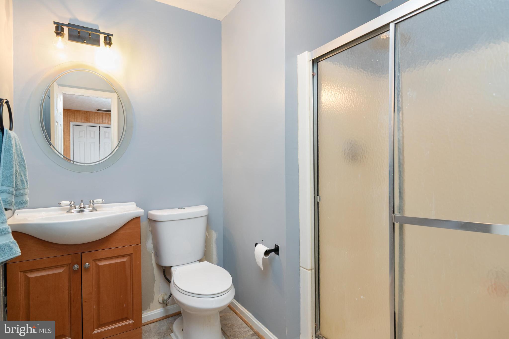 1839 Harbor Drive Chester, MD 21619 - Photo 15 of 23 a bathroom with a toilet sink and mirror