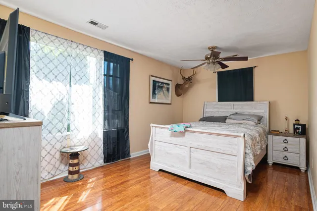 a room with a bed and a window