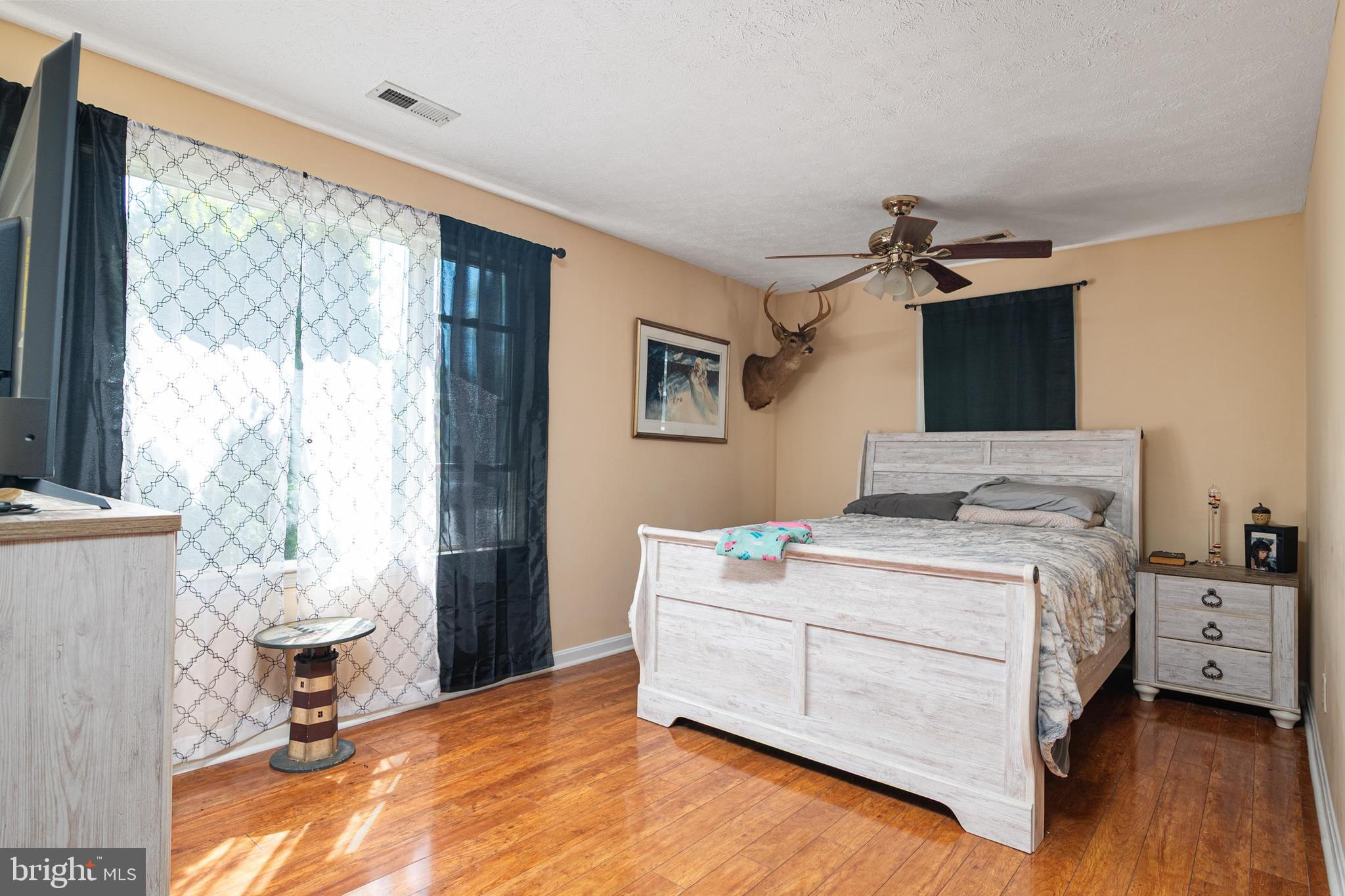 1839 Harbor Drive Chester, MD 21619 - Photo 17 of 23 a room with a bed and a window