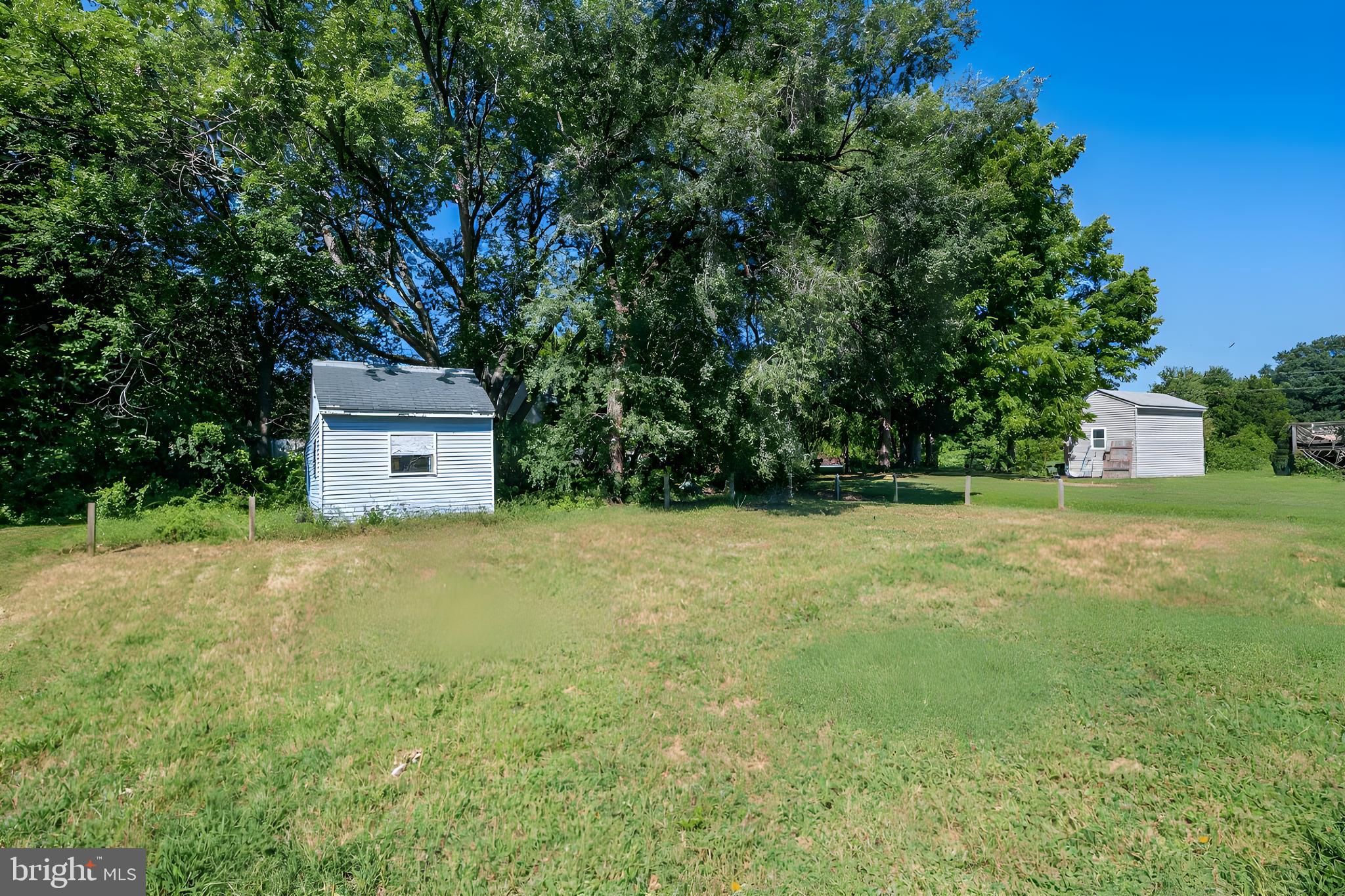 1839 Harbor Drive Chester, MD 21619 - Photo 22 of 23 a house is sitting in middle of the green field