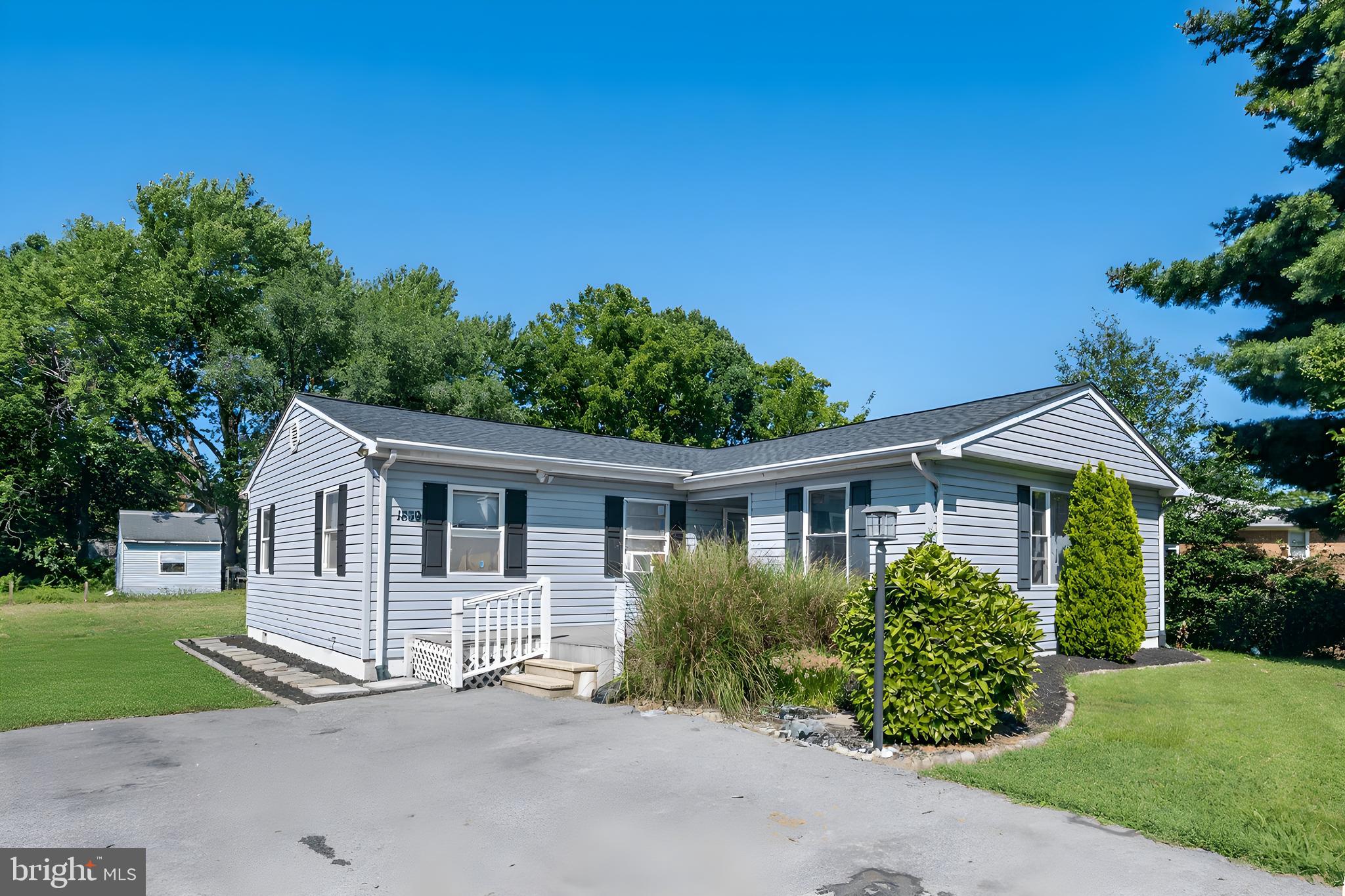 1839 Harbor Drive Chester, MD 21619 - Photo 23 of 23 front view of a house with a yard