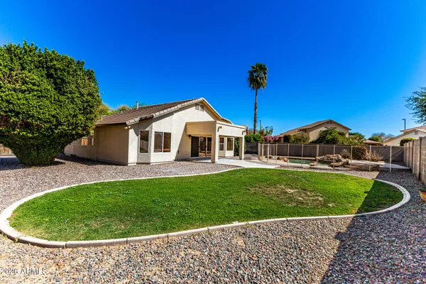 a house view with a backyard space