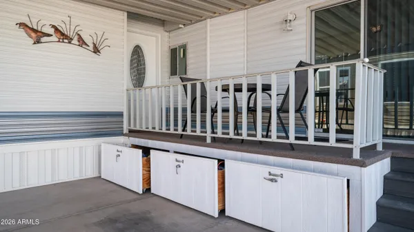 a view of a terrace with furniture and stove
