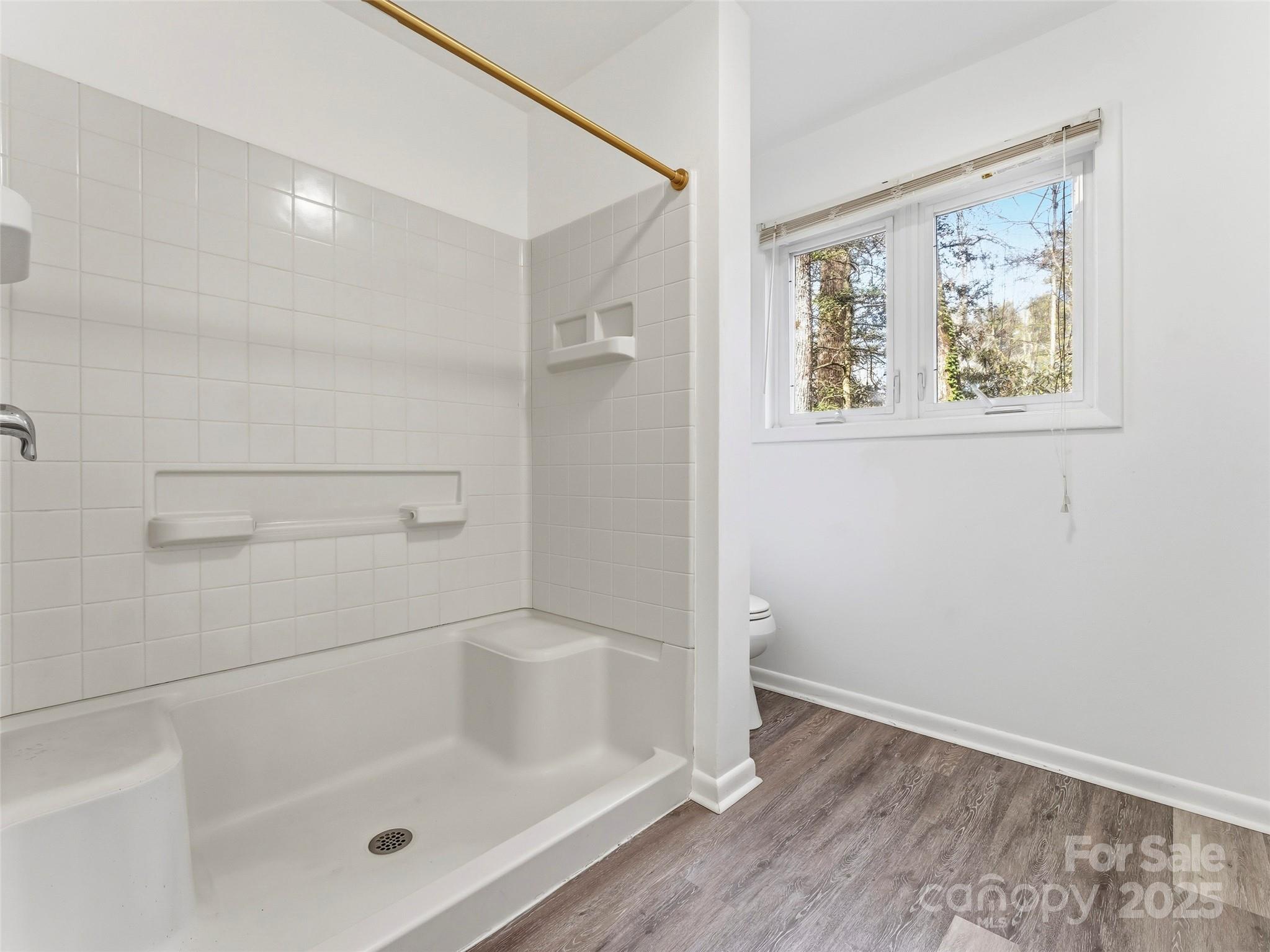 27 Spring Valley Road Pisgah Forest, NC 28768 - Photo 21 of 37 a bathroom with a bathtub