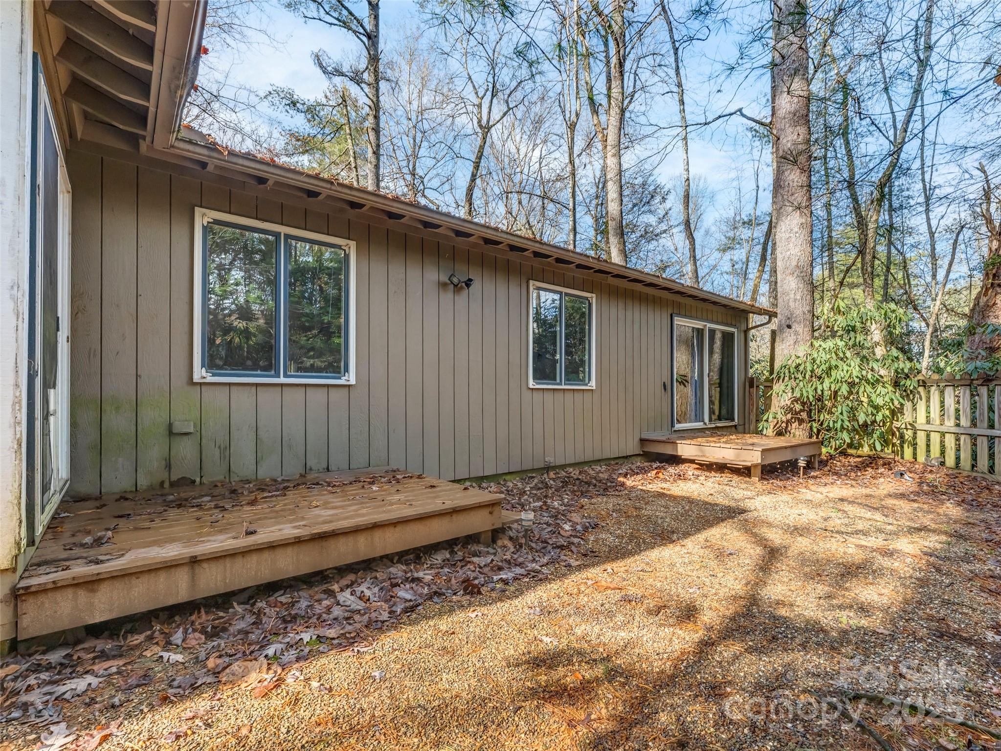 27 Spring Valley Road Pisgah Forest, NC 28768 - Photo 33 of 37 a view of a backyard with a tree