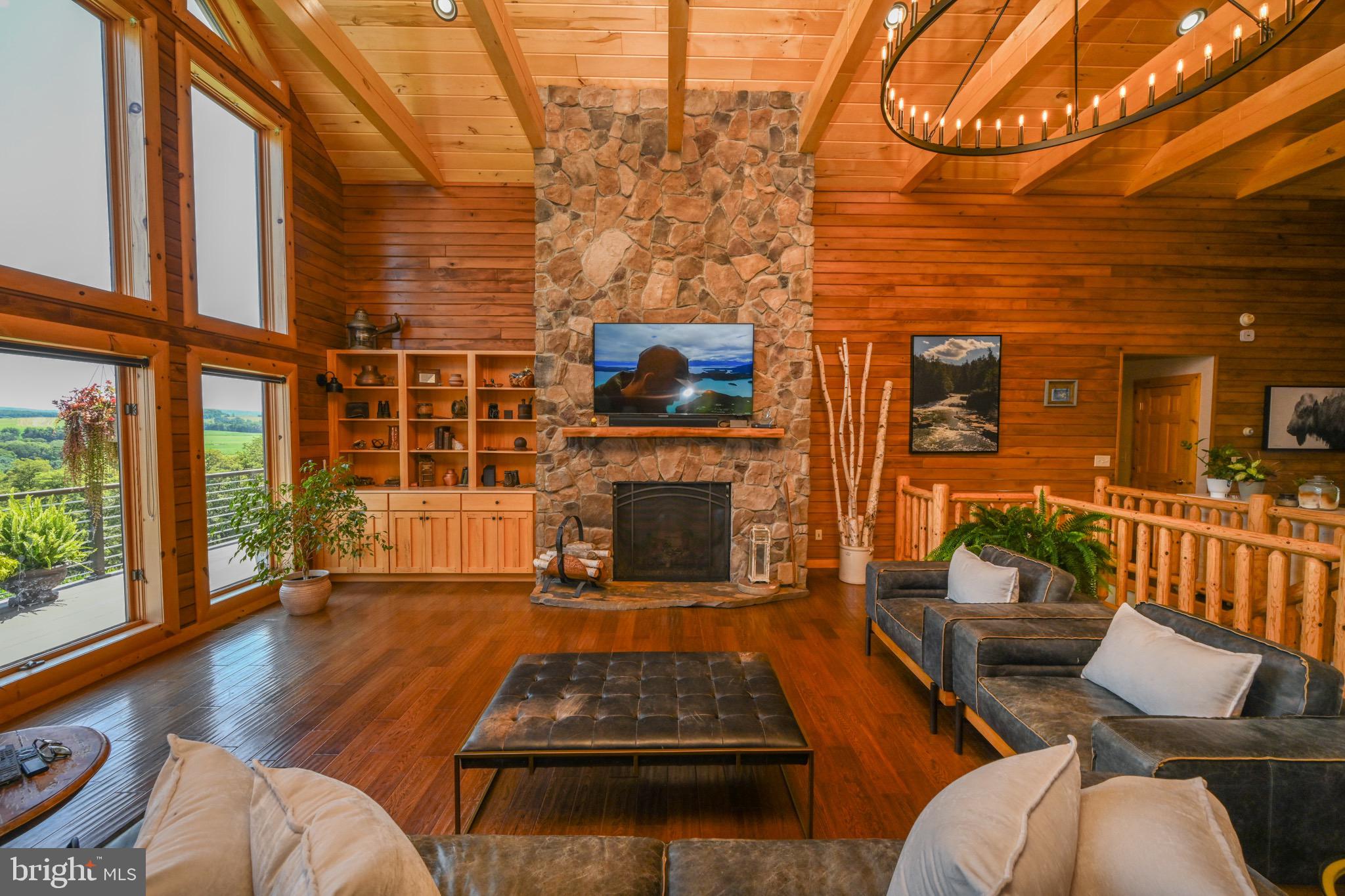 2325 Accident Friendsville Road Accident, MD 21520 - Photo 15 of 107 a living room with furniture and a fireplace