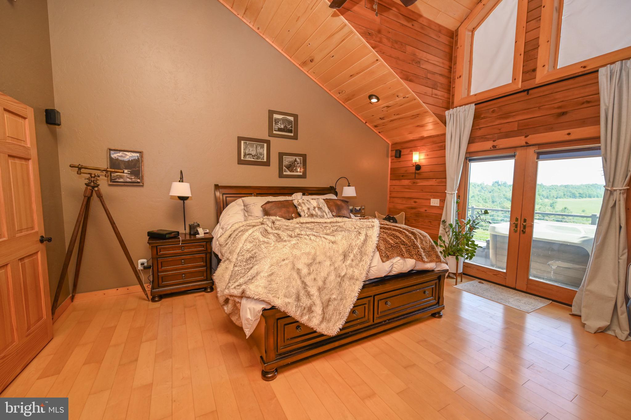 2325 Accident Friendsville Road Accident, MD 21520 - Photo 23 of 107 a bed sitting in a room next to a window