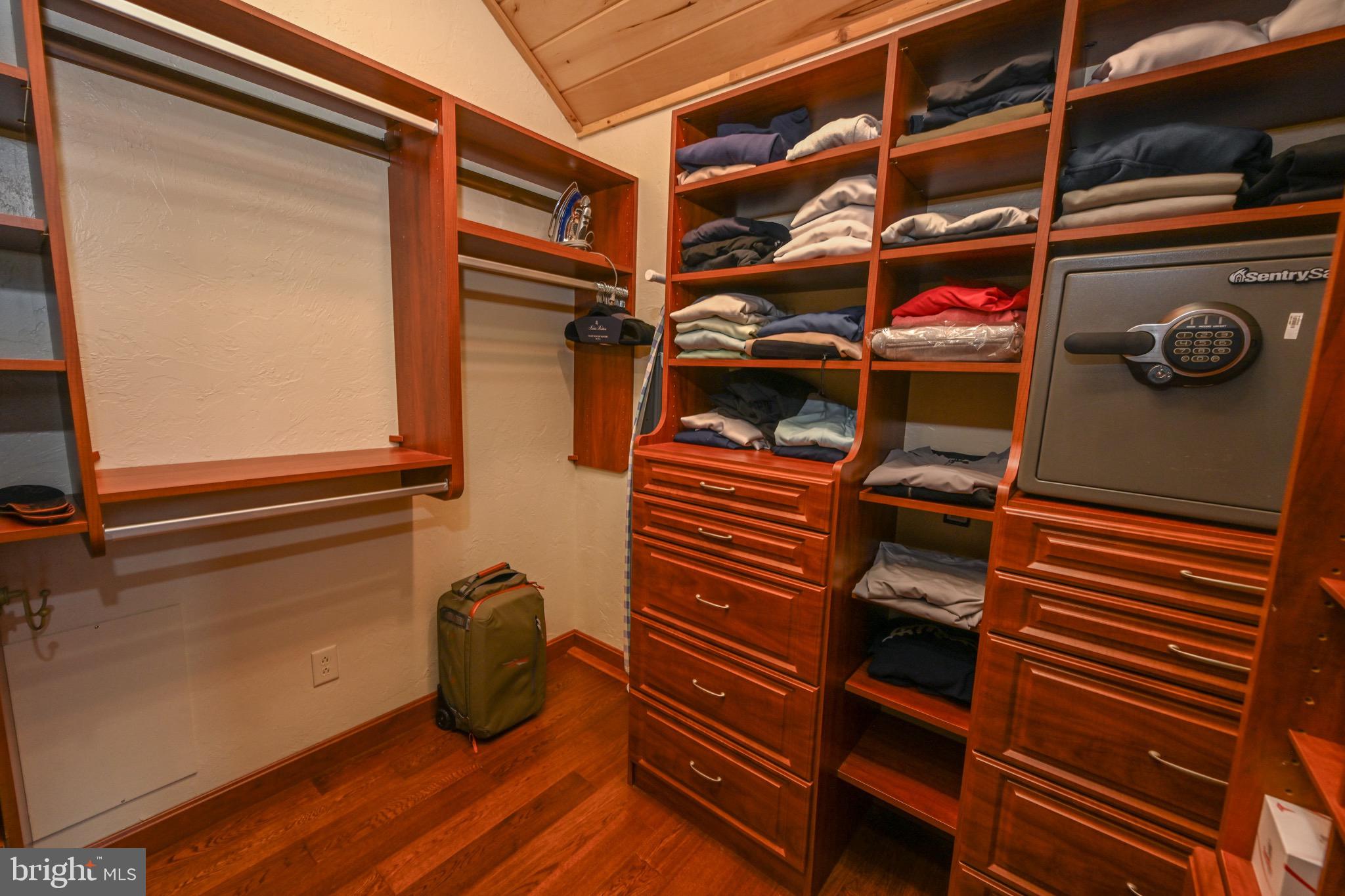 2325 Accident Friendsville Road Accident, MD 21520 - Photo 27 of 107 a view of walk in closet with clothes and shoes