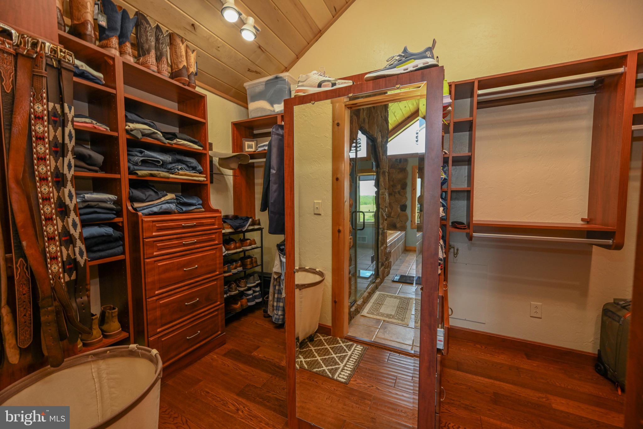 2325 Accident Friendsville Road Accident, MD 21520 - Photo 29 of 107 a view of walk in closet with clothes and shoes