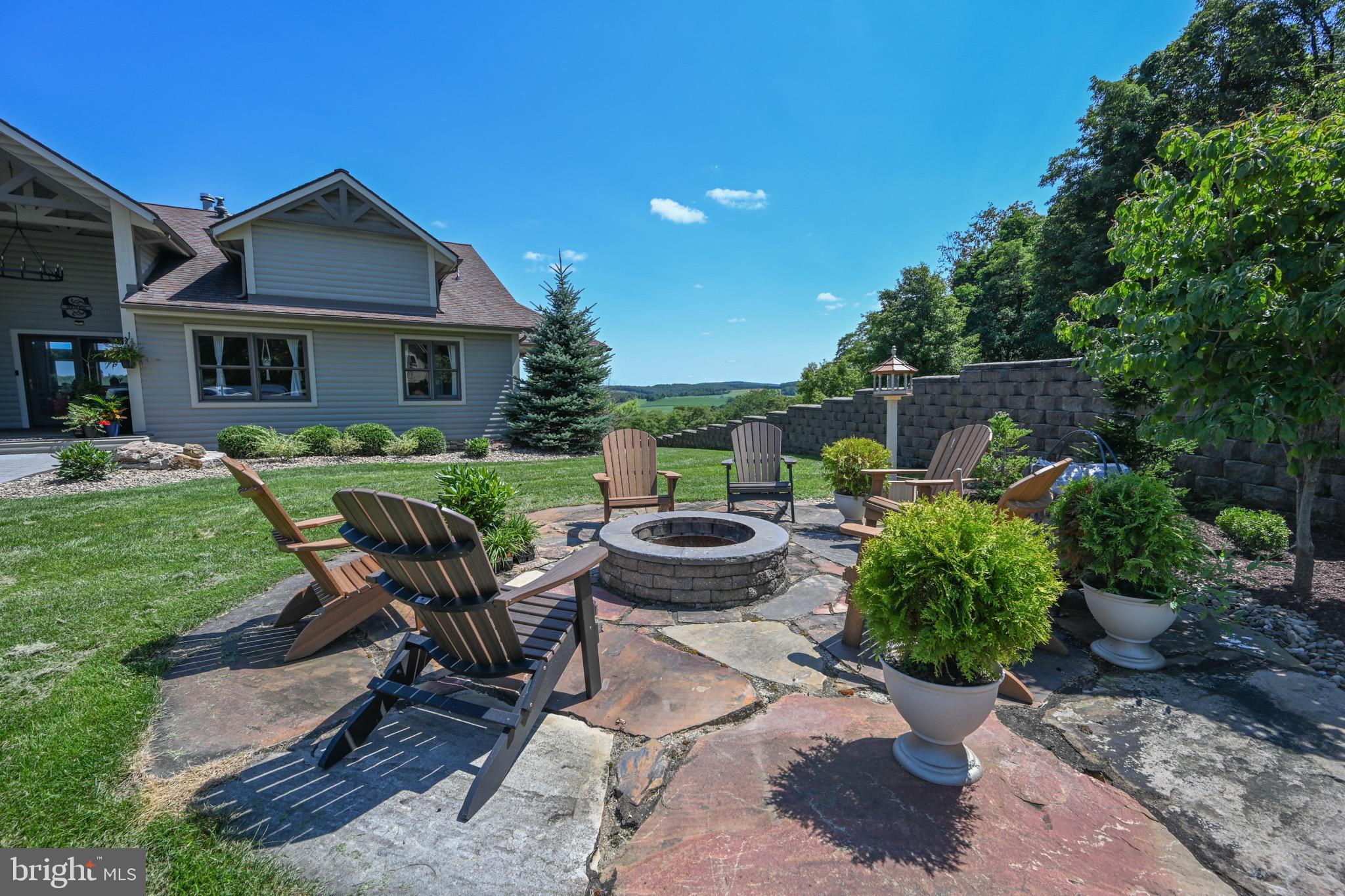 2325 Accident Friendsville Road Accident, MD 21520 - Photo 4 of 107 a view of a patio with chair and tables back yard of the house