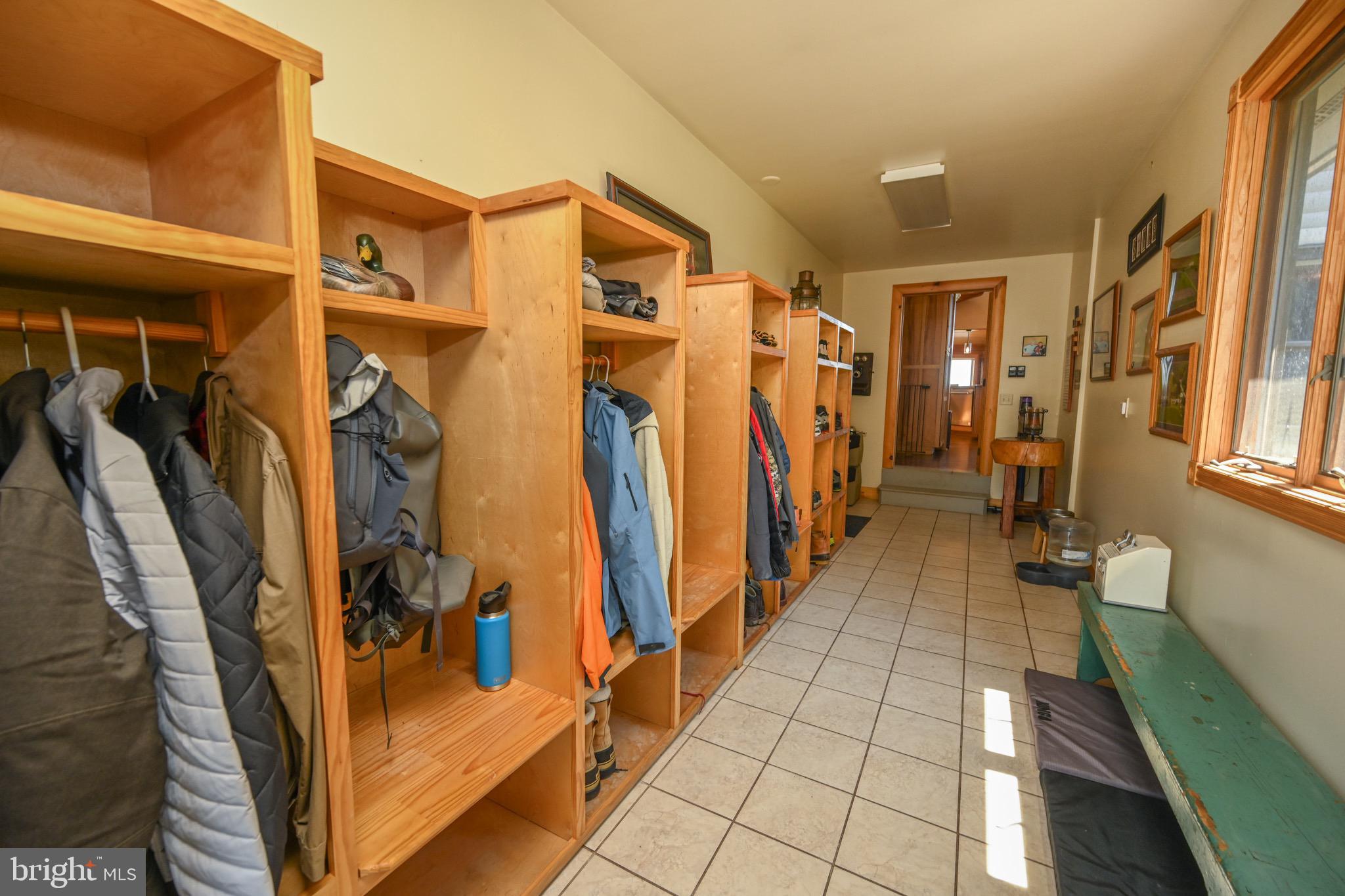 2325 Accident Friendsville Road Accident, MD 21520 - Photo 54 of 107 a view of walk in closet with clothes and shoes
