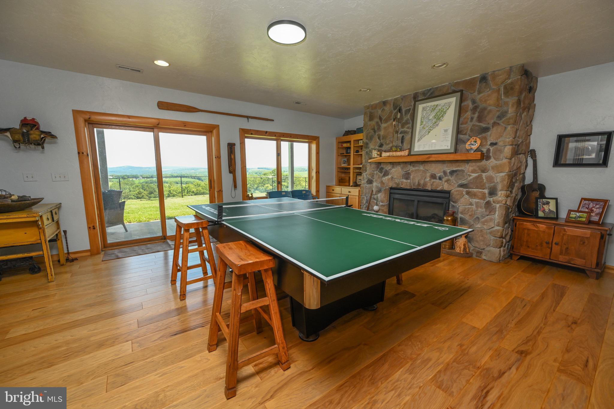 2325 Accident Friendsville Road Accident, MD 21520 - Photo 62 of 107 a view of a livingroom with furniture window and wooden floor