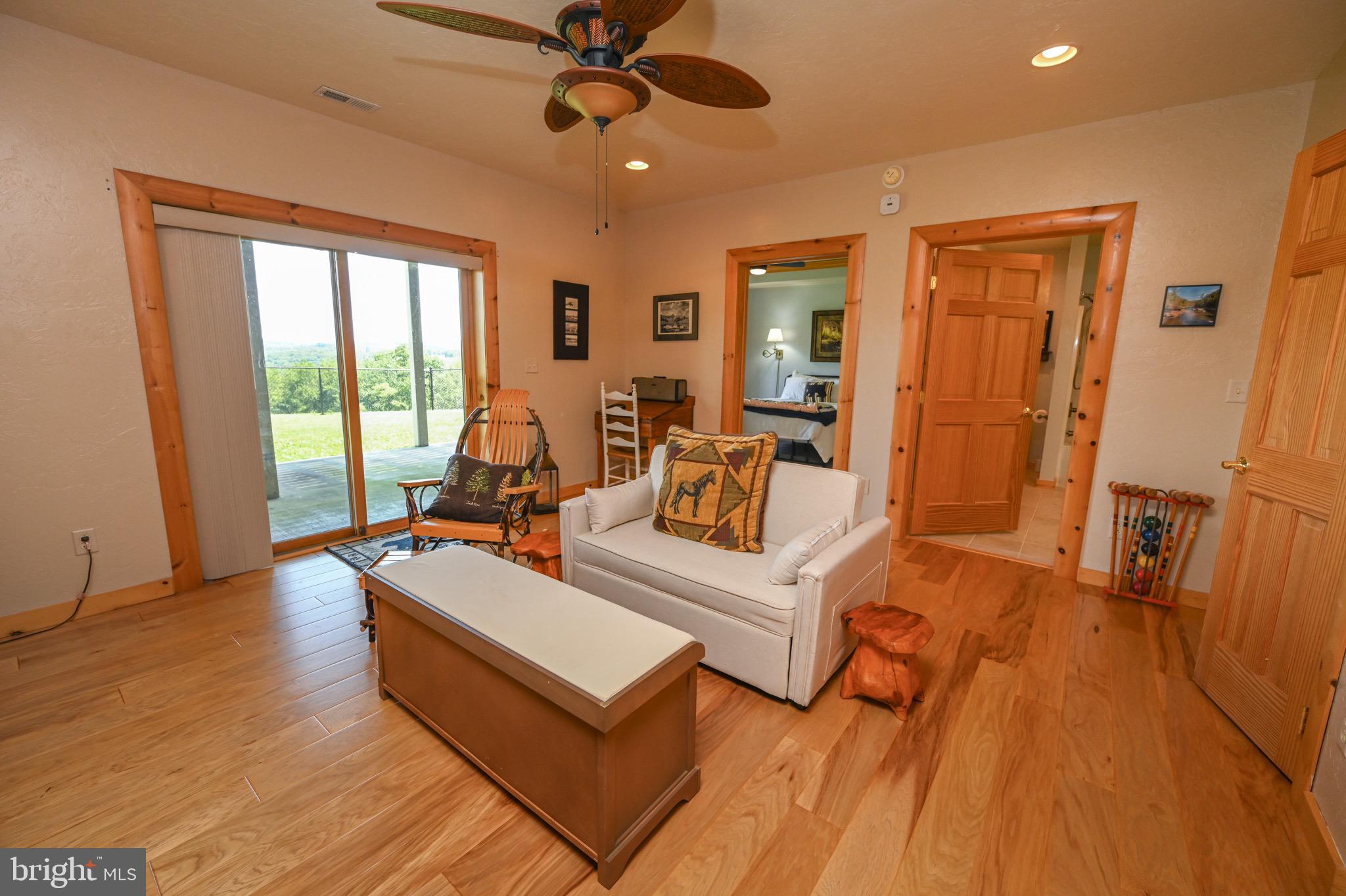 2325 Accident Friendsville Road Accident, MD 21520 - Photo 67 of 107 a living room with furniture and a large window