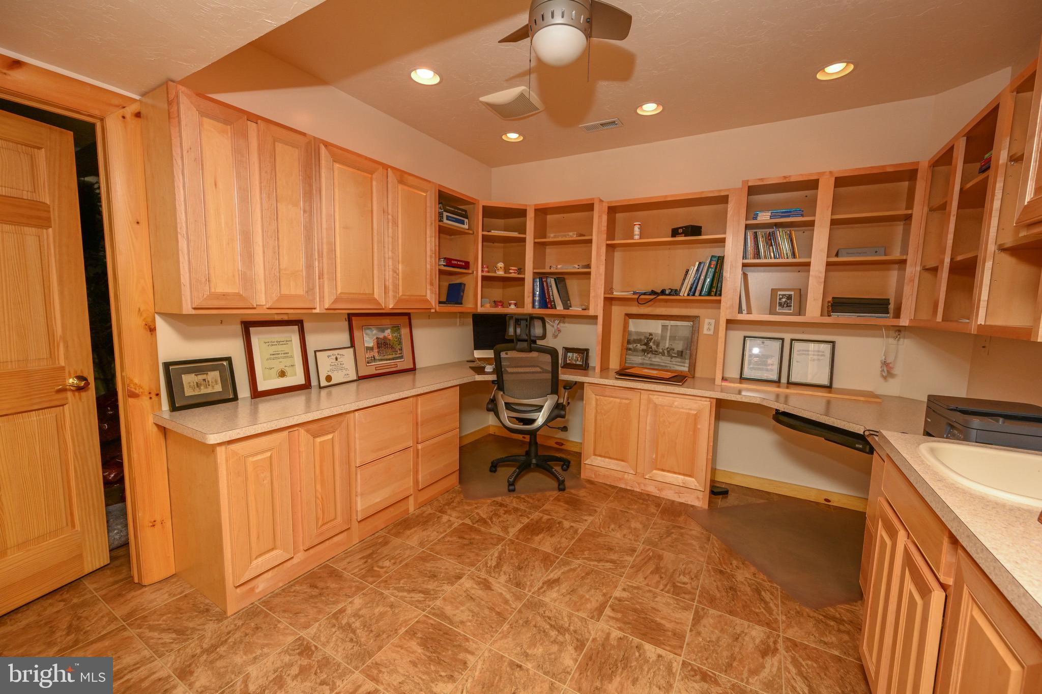 2325 Accident Friendsville Road Accident, MD 21520 - Photo 74 of 107 a kitchen with stainless steel appliances granite countertop a sink and cabinets