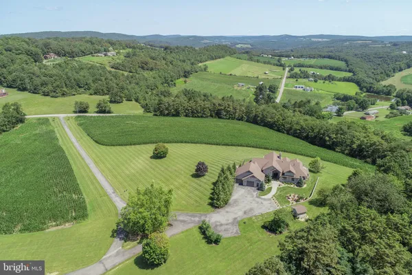 a bed sitting in a room next to a window