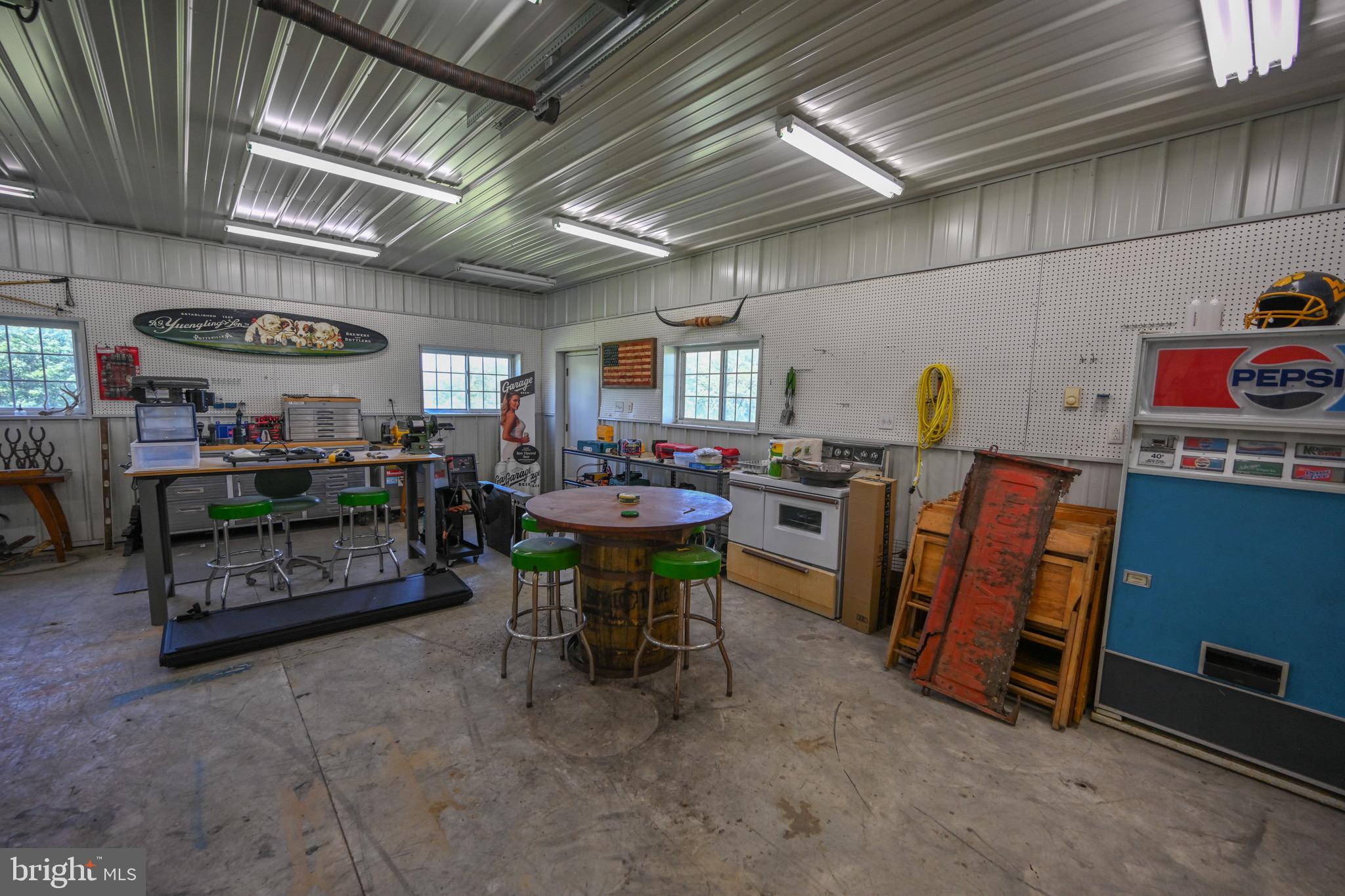 2325 Accident Friendsville Road Accident, MD 21520 - Photo 90 of 107 a room with lots of wooden furniture and a table