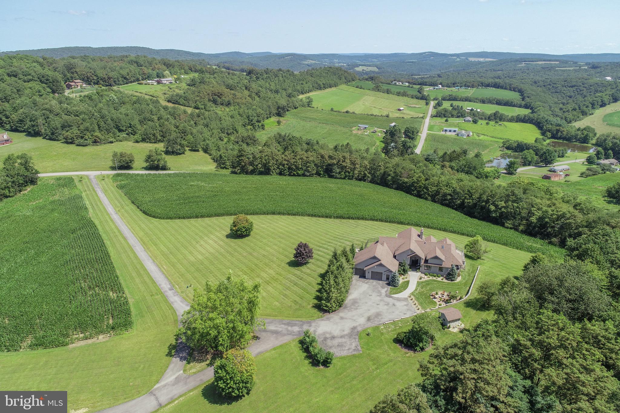2325 Accident Friendsville Road Accident, MD 21520 - Photo 9 of 107 an aerial view of a golf course with parking space