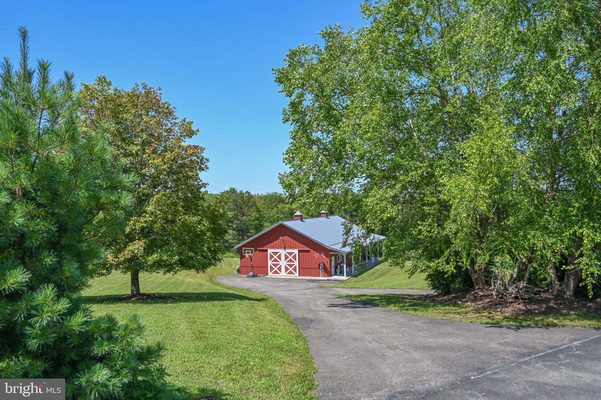 2325 Accident Friendsville Road Accident, MD 21520 - Photo 95 of 107 a view of a street with a tree in the background