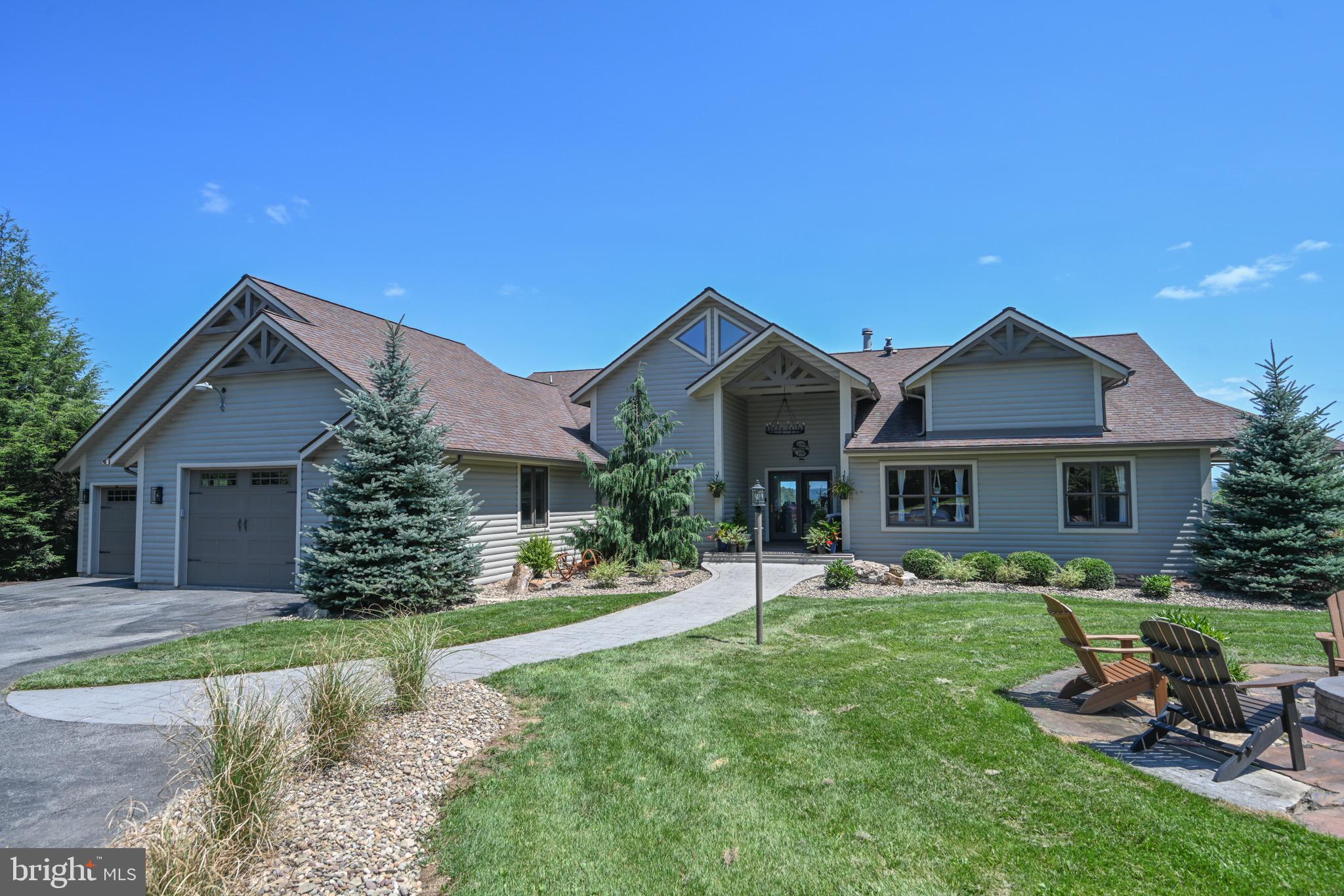 2325 Accident Friendsville Road Accident, MD 21520 - Photo 96 of 107 a front view of house with a garden and patio
