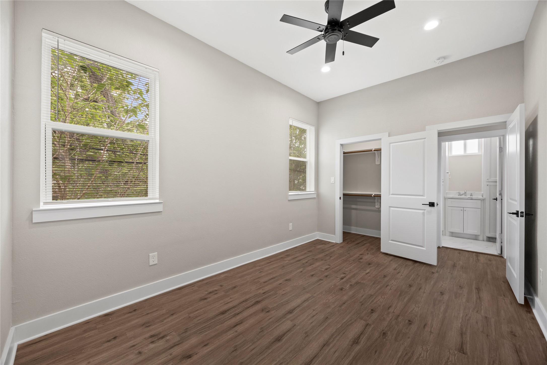 4384 Fiesta Lane Houston, TX 77004 - Photo 6 of 11 a view of an empty room with a window and wooden floor