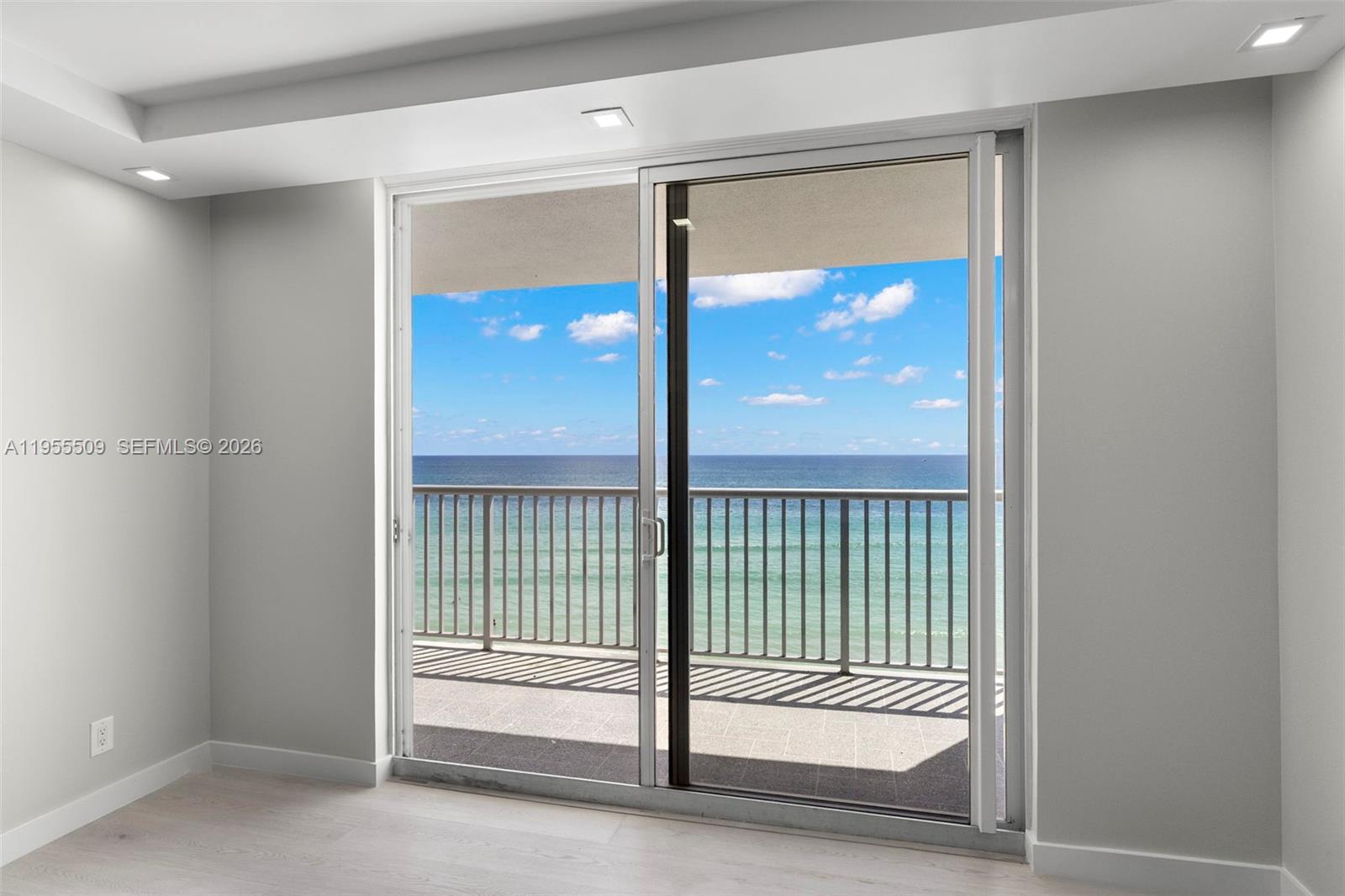 400 North Surf Road, Unit 903 Hollywood, FL 33019 - Photo 14 of 36 a view of a glass door and a window