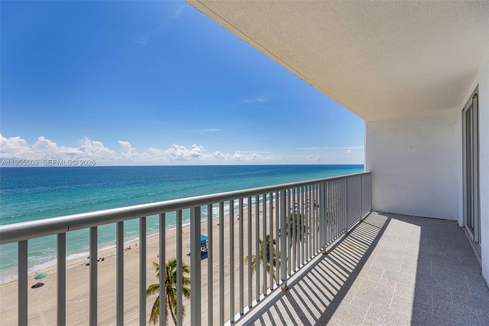 400 North Surf Road, Unit 903 Hollywood, FL 33019 - Photo 8 of 36 a balcony with wooden floor